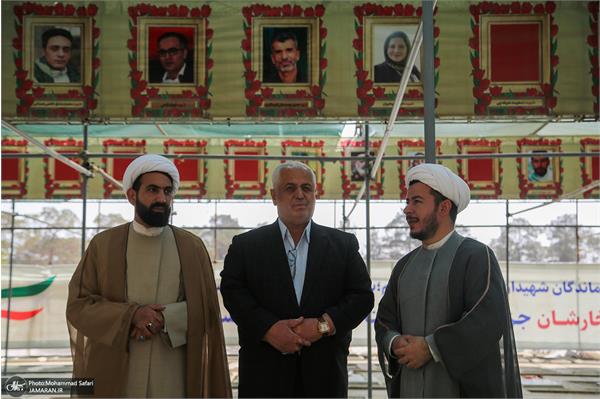 عطر افشانی مزار شهدا 15