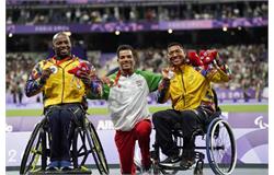 Paris 2024 Paralympics | Iran's Saeid Afrooz rings the bell at the Stade de France