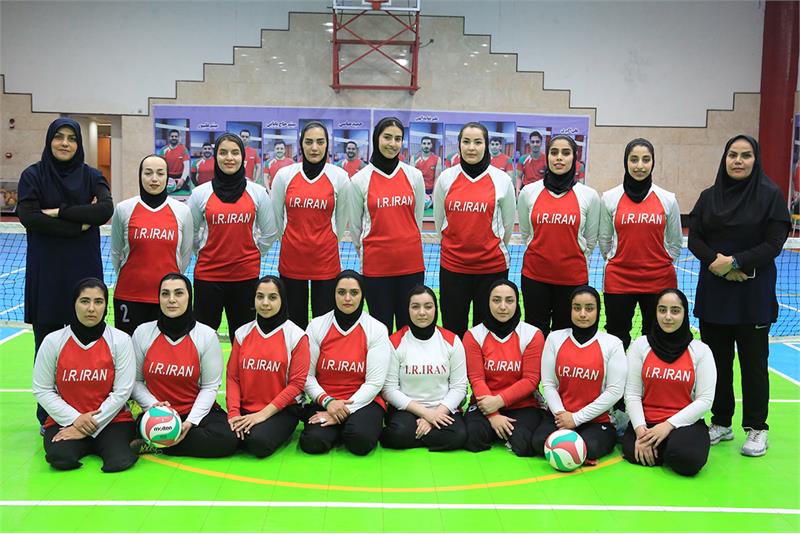 Women sitting volleyball