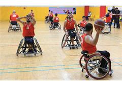 Men's players reunite at 13th wheelchair basketball camp